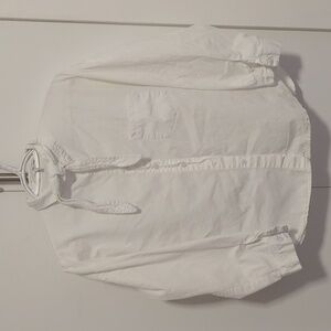 Boxy blouse with bow tie collar